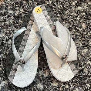 Brand New in Box MK Flip Flops!